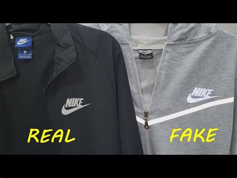 bad fake nike track suit|how to spot a nike zip suit.